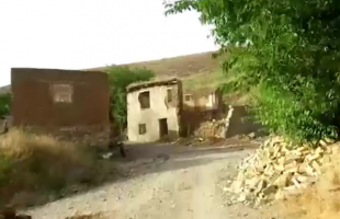 ویدیویی ماندگار از روستای مدفون شده ی بالان در دریاچه سد سردشت